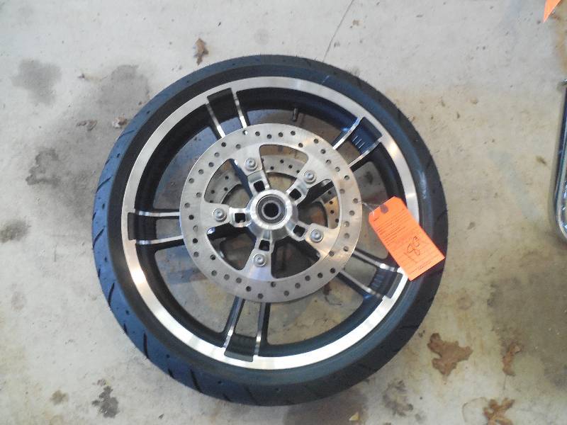 lot 189 image: 2016 Harley Front Rim & Tire - NEW