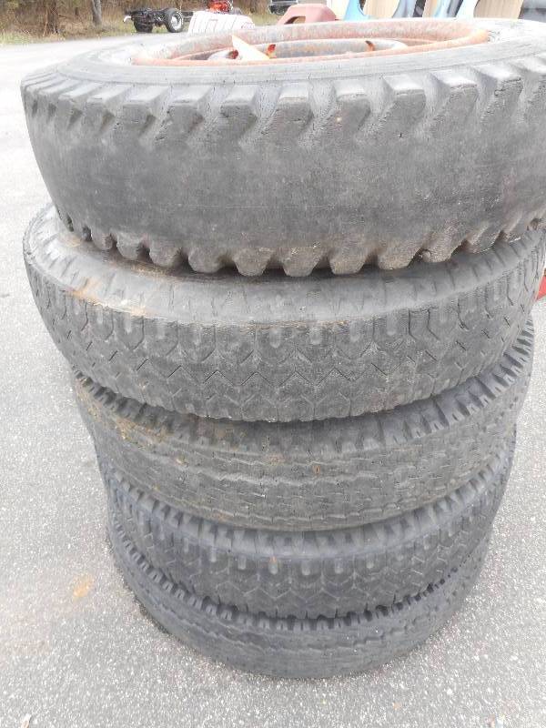 lot 457 image: (5) 8 Lug Steel Rims With Tires