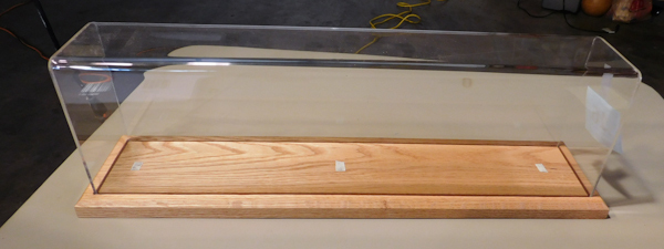 lot 16 image: Display case 22 x 4 and 7Tall with lucite cover wooden oak