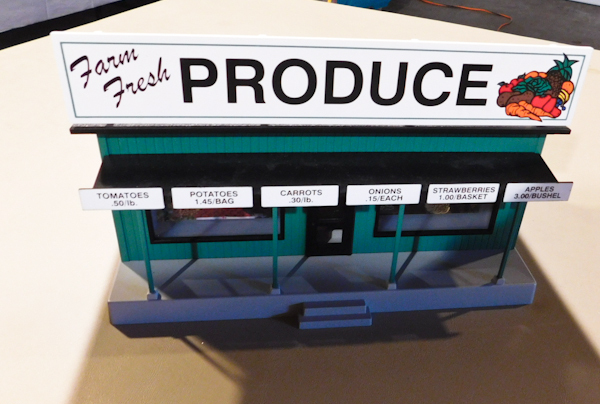 lot 27 image: Model train accessory Produce Station