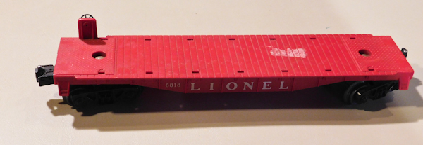 lot 37 image: Red Lionel platform car