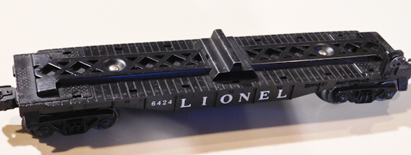 lot 39 image: Vintage Black Lionel platform car