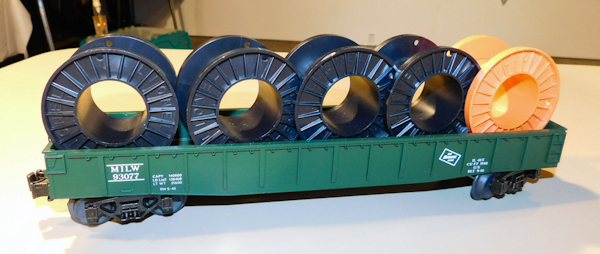 lot 41 image: Model trains, collectible, Dark Green cargo car with large spools of cargo