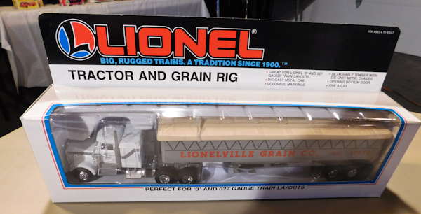 lot 48 image: Lionel  Tractor and Grain Rig in box ,Model trucks, collectible,