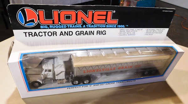lot 49 image: Lionel  Tractor and Grain Rig in box ,Model trucks, collectible,