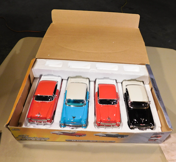 lot 68 image: Set of 4 die cast cars, Showroom