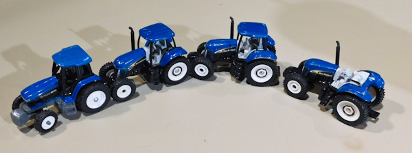 lot 82 image: New Holland die cast tractors