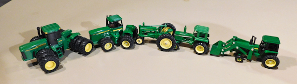 lot 83 image: John Deere die cast tractors