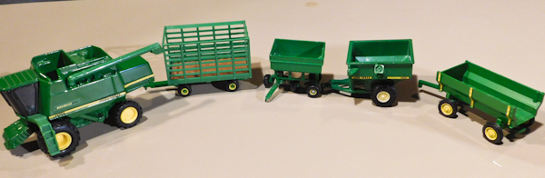 lot 85 image: ERTL custom John deere 9510 maximizer combine & more