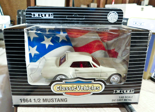 lot 102 image: ERTL die cast 1964 Mustang (NIB)