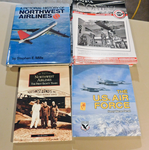 lot 126 image: Northwest Airline books & Contrails magazines