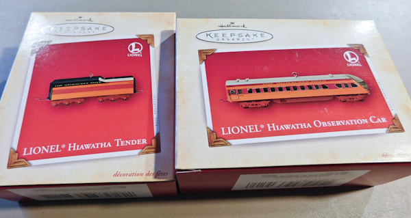 lot 142 image: Two Lionel train Hallmark ornaments (NIB)