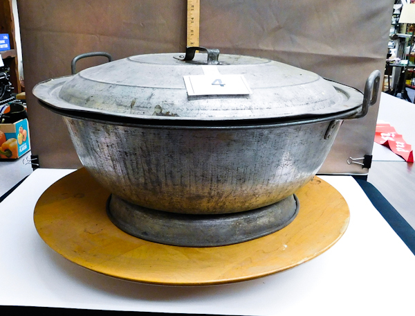 Large antique metal bread proofing bowl and lid on a modern lazy Susan ...