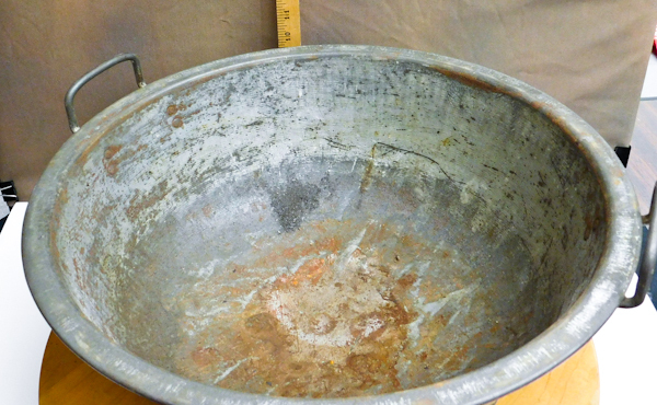 Large antique metal bread proofing bowl and lid on a modern lazy Susan ...