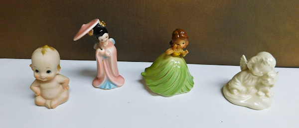 lot 12 image: Vintage figurines, Kewpie, Hula dancer & more