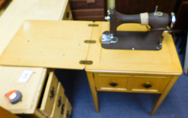 lot 20 image: Vintage sewing machine in wood cabinet
