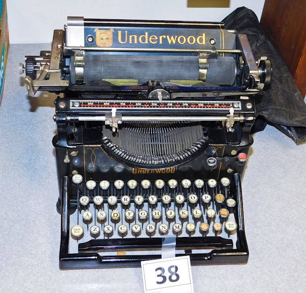 lot 38 image: vintage Underwood typewriter in very clean condition has all of the keys