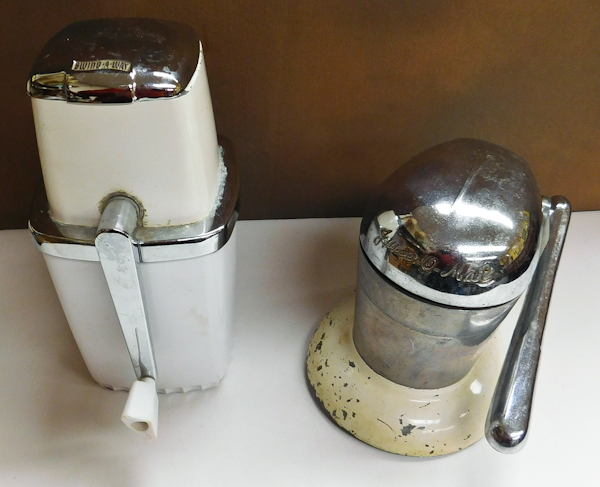 lot 33 image: 2 vintage citrus juicers, Swing A Way & Juice-o-mat