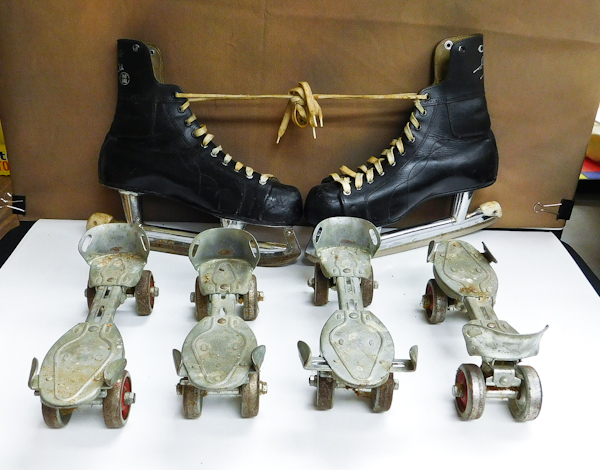 lot 37 image: Two pair of vintage steel wheel roller skates and pair of vintage ice skates