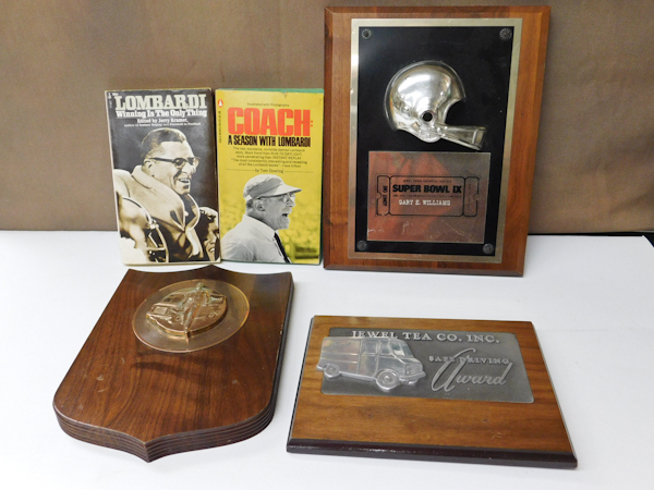 lot 126 image: Vince Lombardi books and misc wall plaques