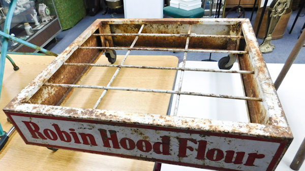 lot 171 image: vintage Robin Hood Flour metal Display mover with caster wheels