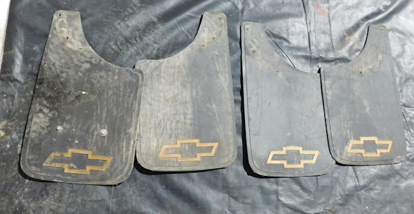 lot 207 image: 4 chevy mud flaps in ok condition