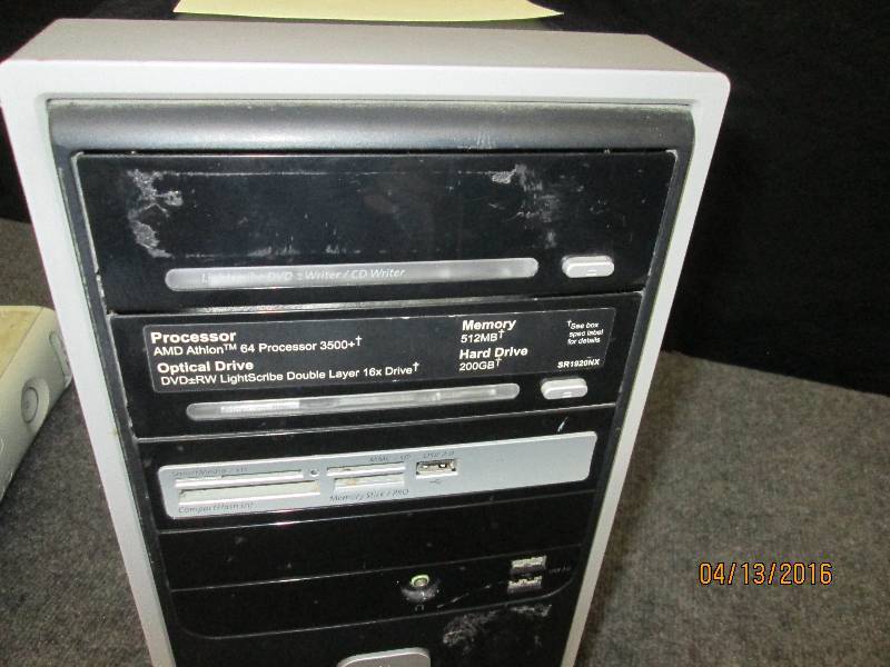 lot 306 image: Compaq computer tower, Athlon 64 2.2GHz  512 MB RAM tested good.  Hard drive not included