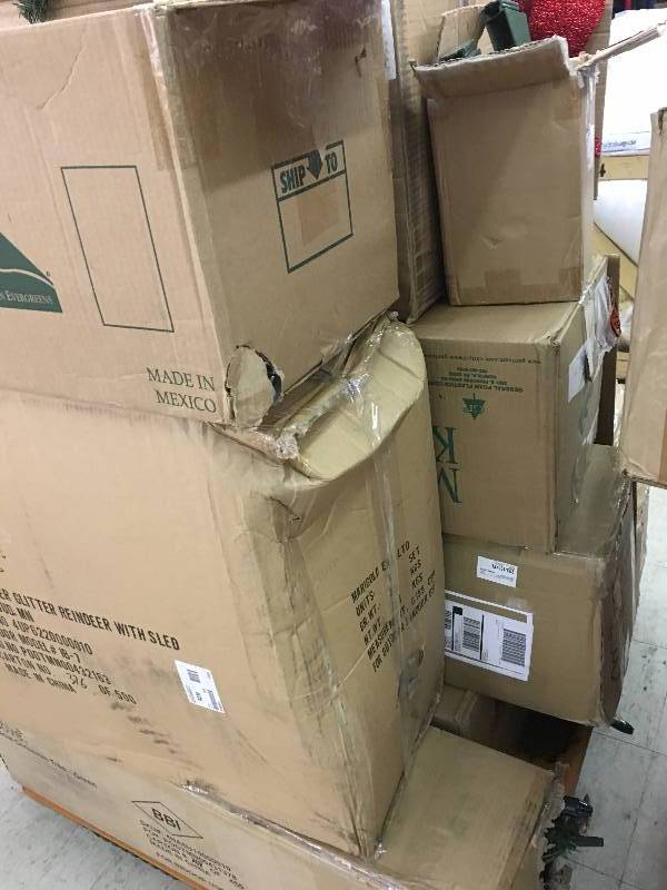 pallet of new christmas items trees,wreaths decorations and more over $500 in value