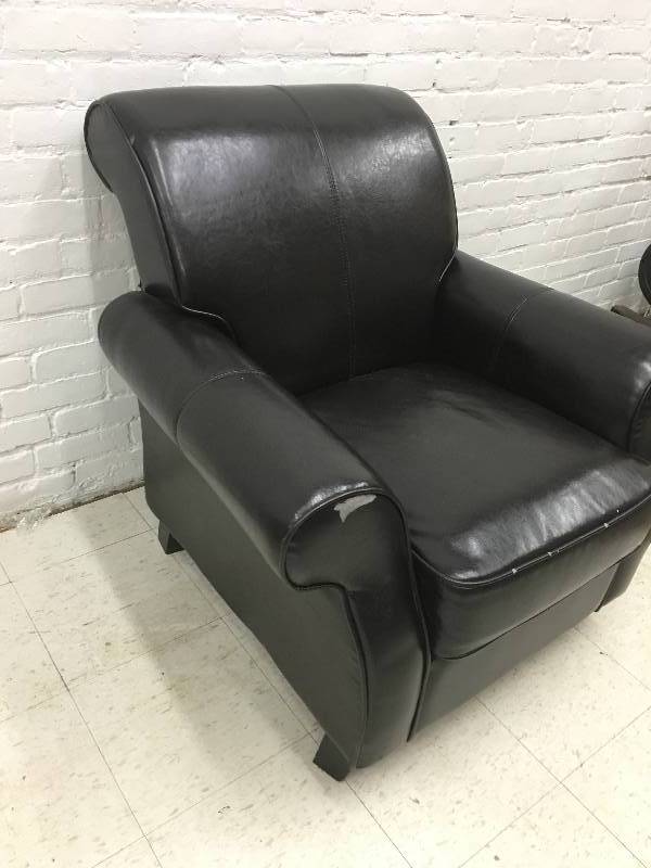 new black chair has damage on each arm