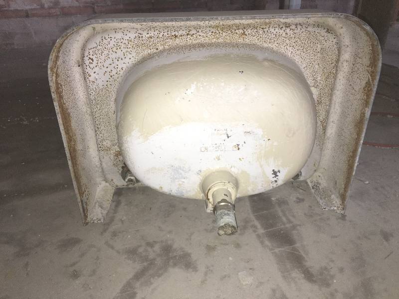 antique cast iron sink from a 1950s farmhouse