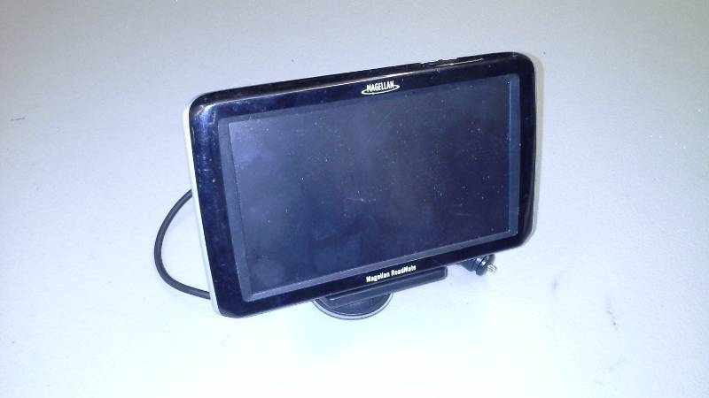 (1) Magellan RoadMate GPS