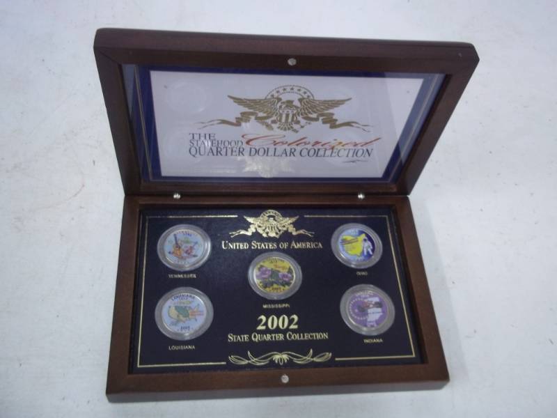 lot 19 image: 2002 The Statehood Colorized Quarter Dollar Collection