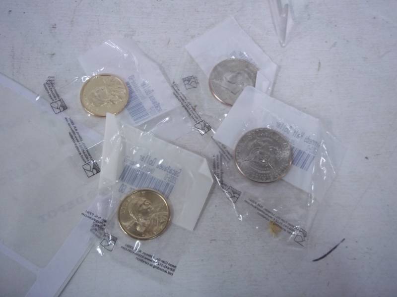 lot 31 image: Uncirculated 2003 Kennedy half dollar P and D 2003 Sacagawea Dollar P and D
