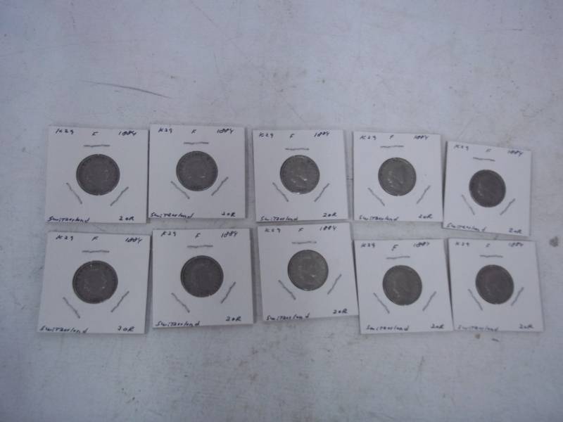 lot 50 image: 10 Foreign Coins