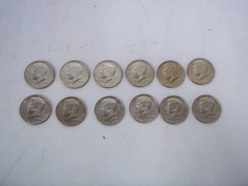 lot 57 image: 12 1976 Kennedy half Dollars