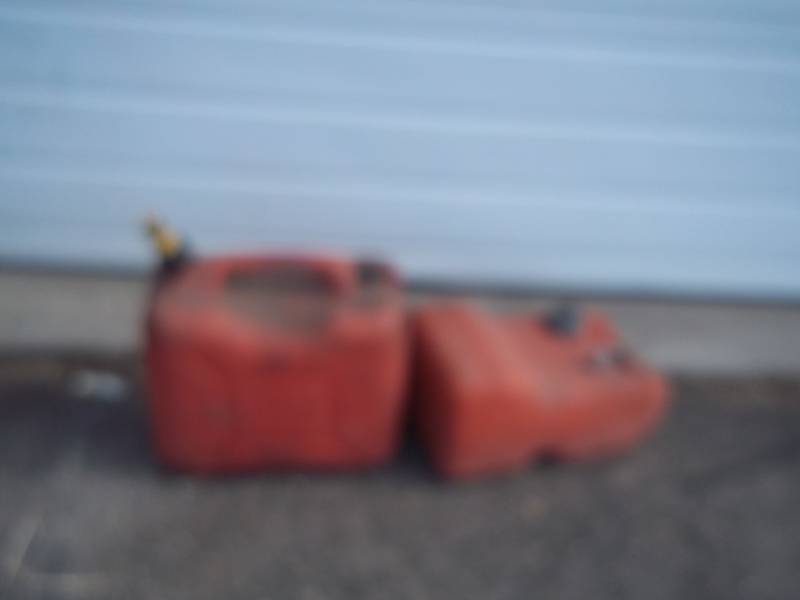 lot 67 image: 3.3 gallon boat gas tank and 5 gallon gas tank