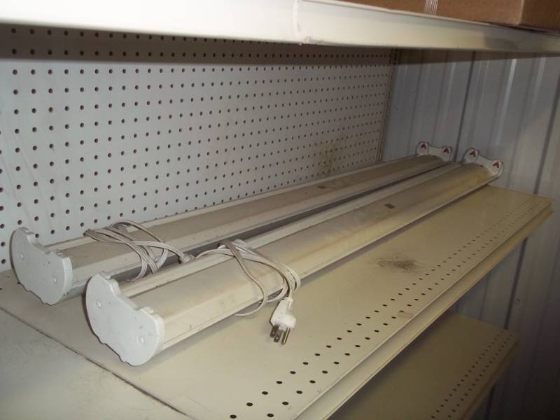 lot 69 image: Pair of 4 Florescent Light fixtures with plug in