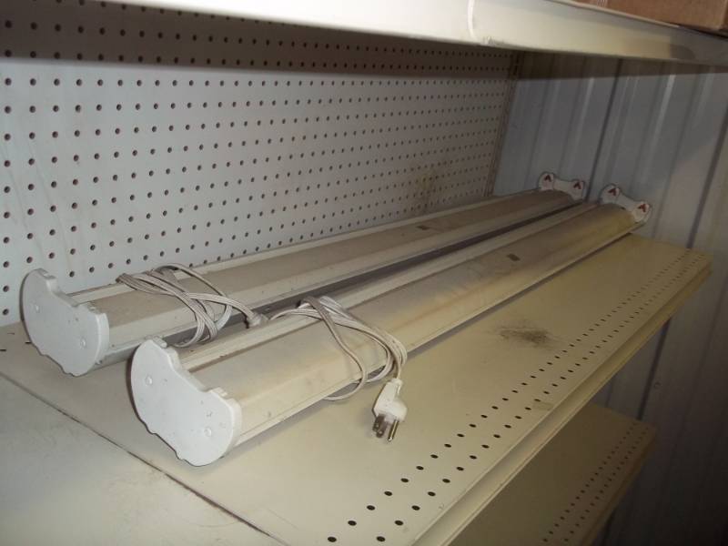 lot 70 image: Pair of 4 Florescent Light fixtures with plug in