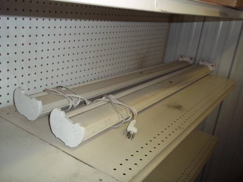 lot 71 image: Pair of 4 Florescent Light fixtures with plug in