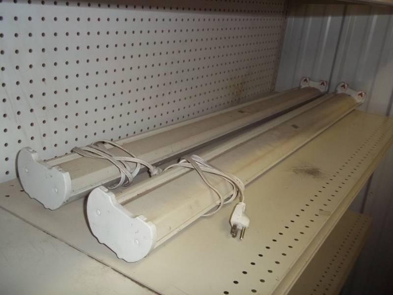 lot 74 image: Pair of 4 Florescent Light fixtures with plug in