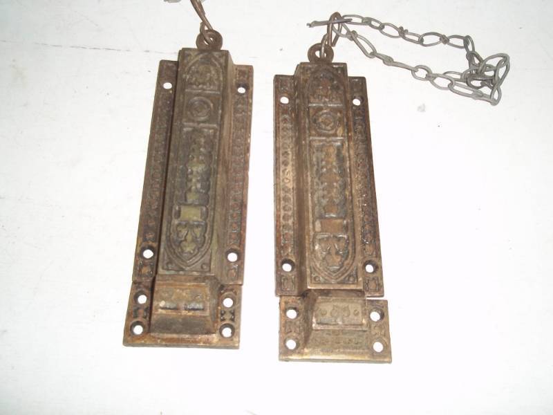 lot 299 image: Pair of vintage door latches