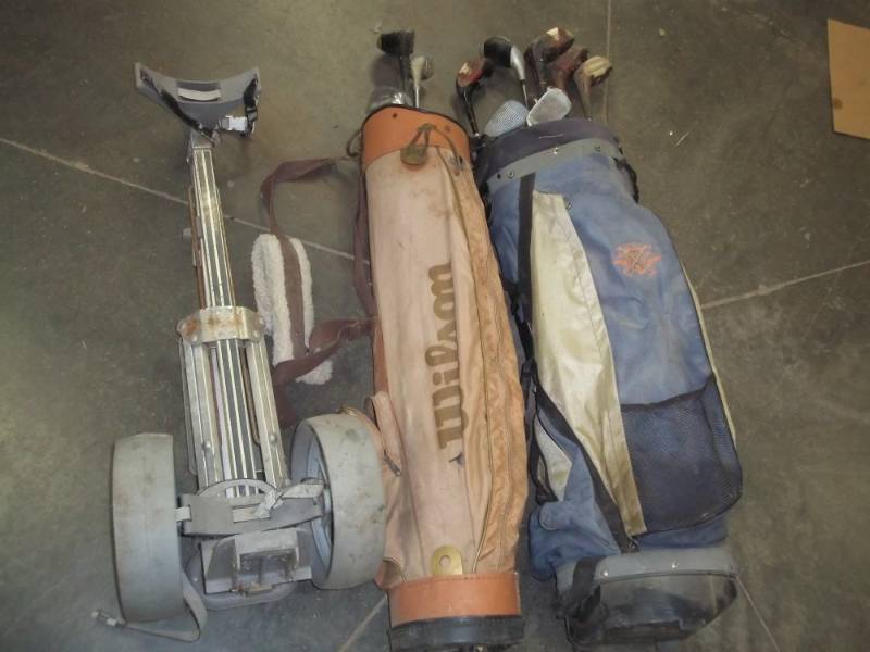 lot 322 image: Pair of golf club sets with case and dolly