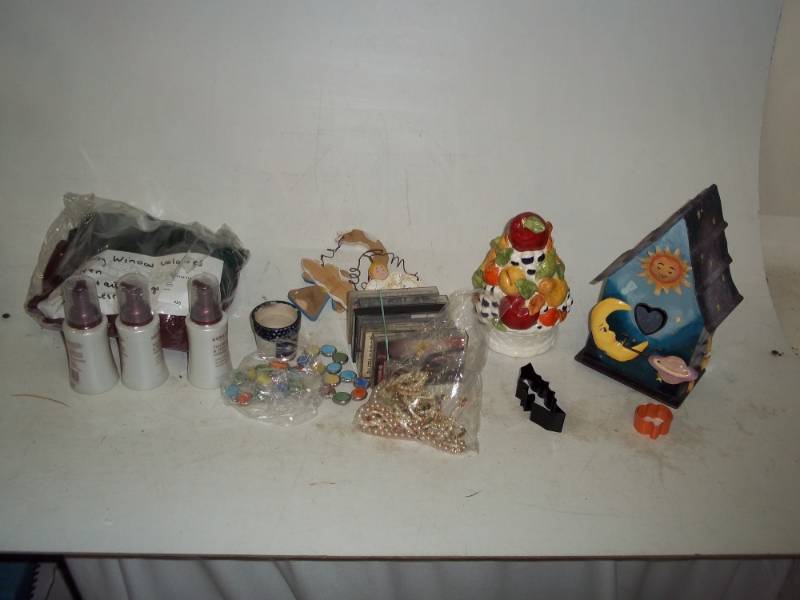 lot 416 image: Dcor items and jewelry, dcor bird house, cassette tapes and window valances