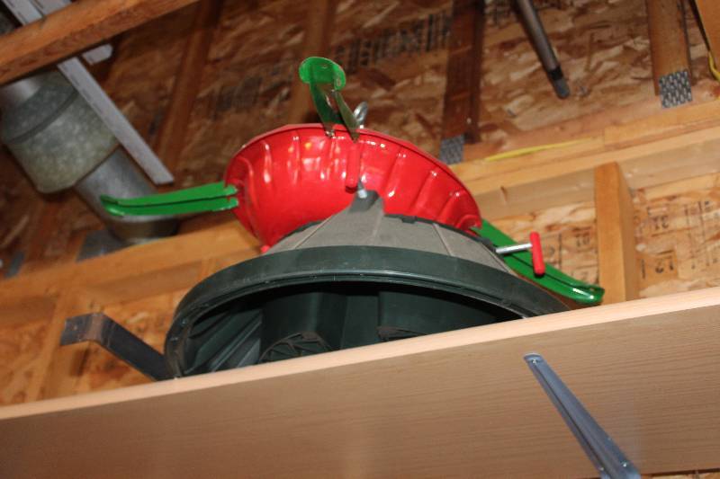 lot 97 image: Shelf Lot Including Christmas Tree Stand, Hunter Ceiling Fan Home Canning Jars