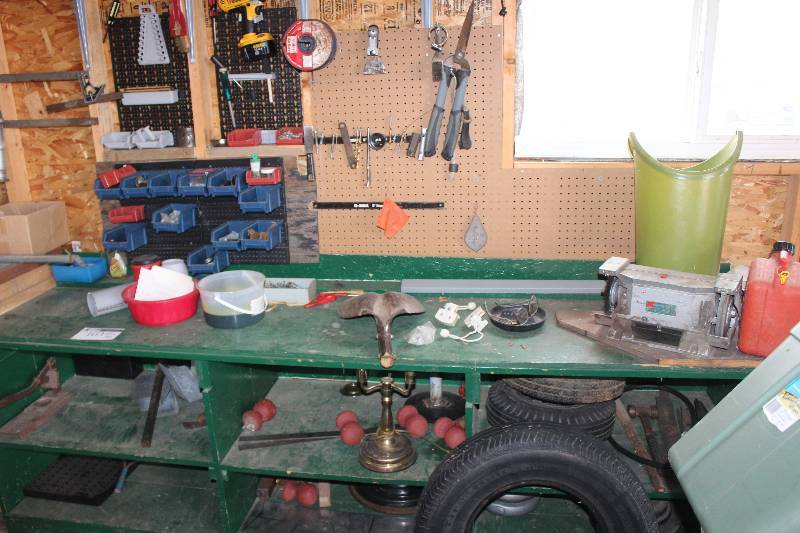 lot 103 image: Contents of Wall and Shelfs Including Tools, Organizers, Tires, Decorations