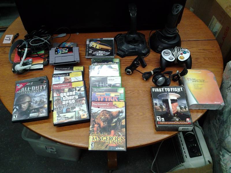 lot 63 image: Assorted Video Games (XBox, Play Station, PC), Controllers, & Joy Sticks