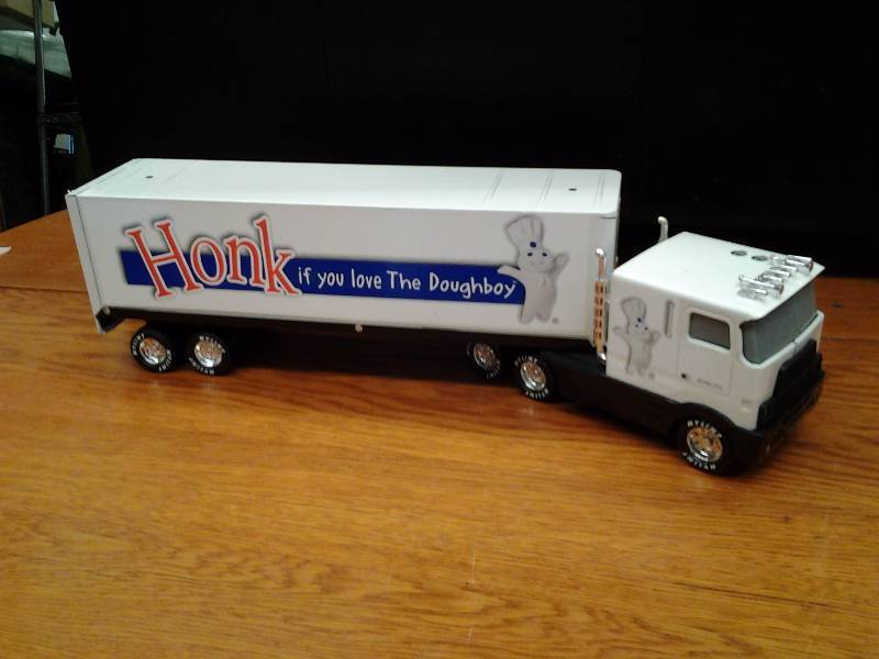 lot 75 image: Nylint Metal Truck & Trailer With Sound Feature