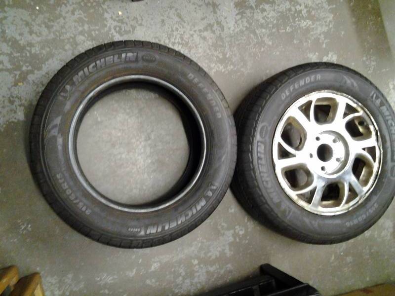 lot 92 image: 2-Michelin Defender Tires With Good Tread 21560 R-16