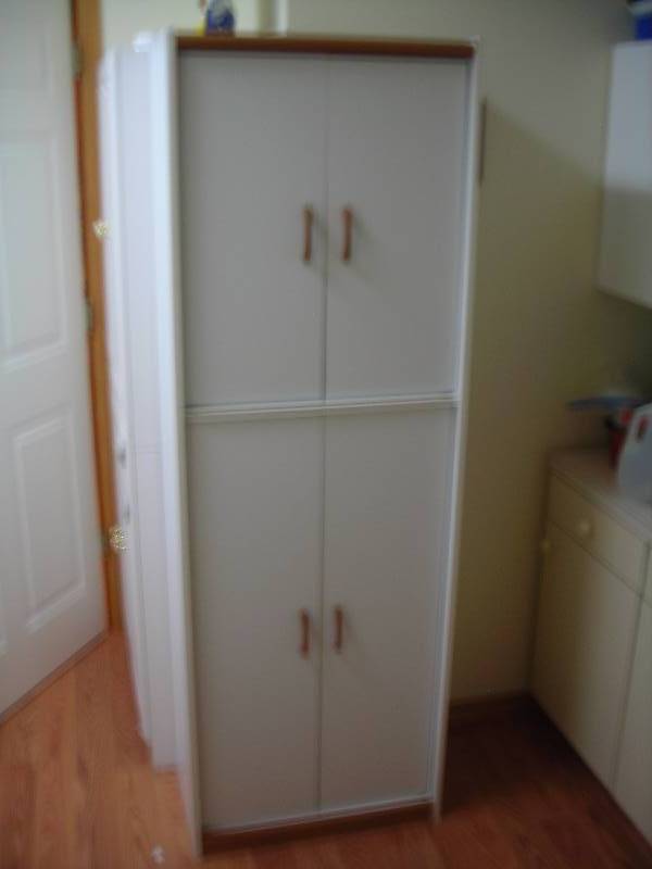 lot 49 image: 4-Door Cupboard 24x72x15