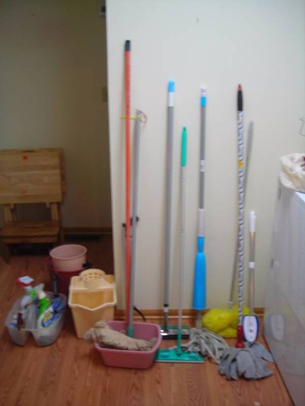 lot 51 image: Large Lot Of Cleaning Supplies, Mops, Buckets, Swiffers, More